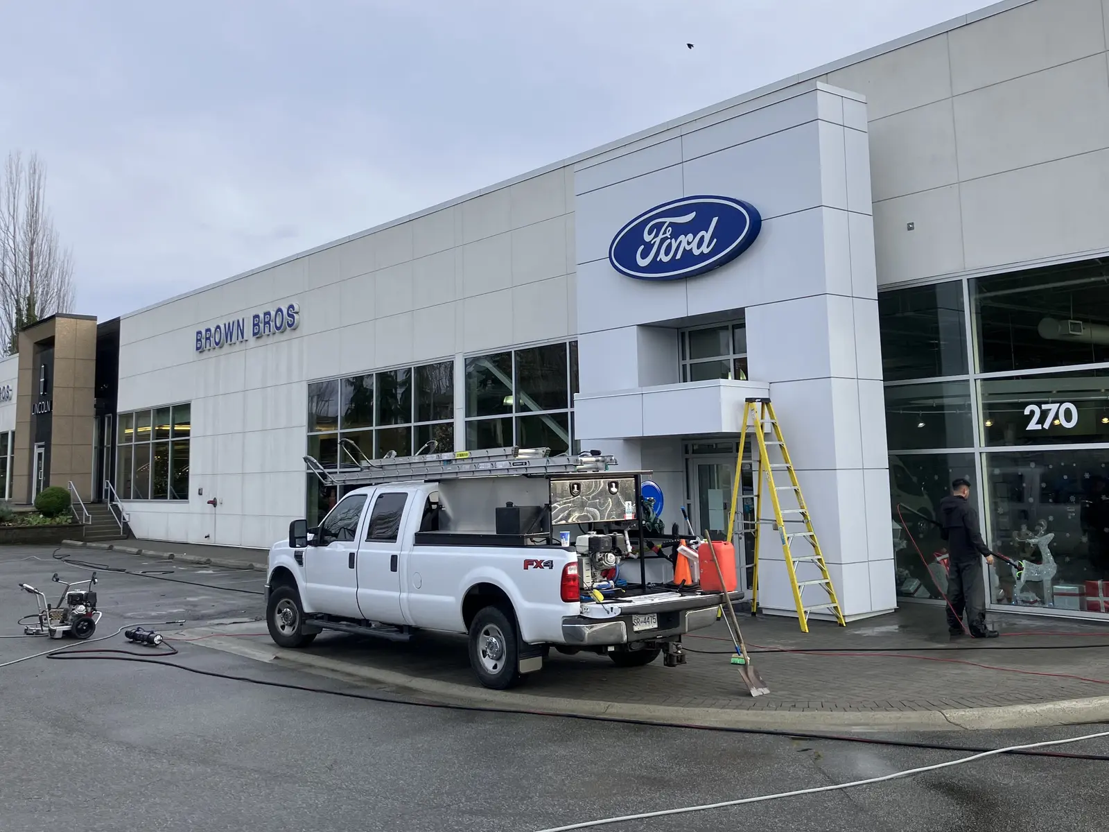 EPS technician cleaning a premium West Coast home